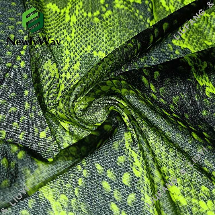 Idizayini ye-snakeskin e-fluorescent eluhlaza ephrintiwe inayiloni elula i-tricot knit lace fabric online wholesale-12