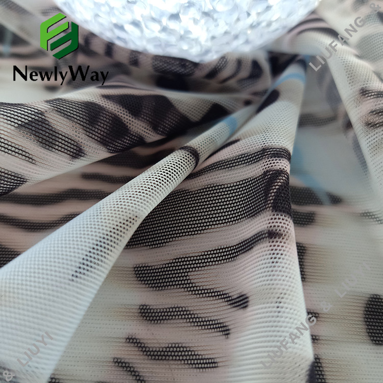 Zebra ແລະດອກໄມ້ທີ່ມີຮູບແບບພິມ Nylon Spandex Mesh Lace Fabric ສໍາລັບເຄື່ອງນຸ່ງຫົ່ມ-9